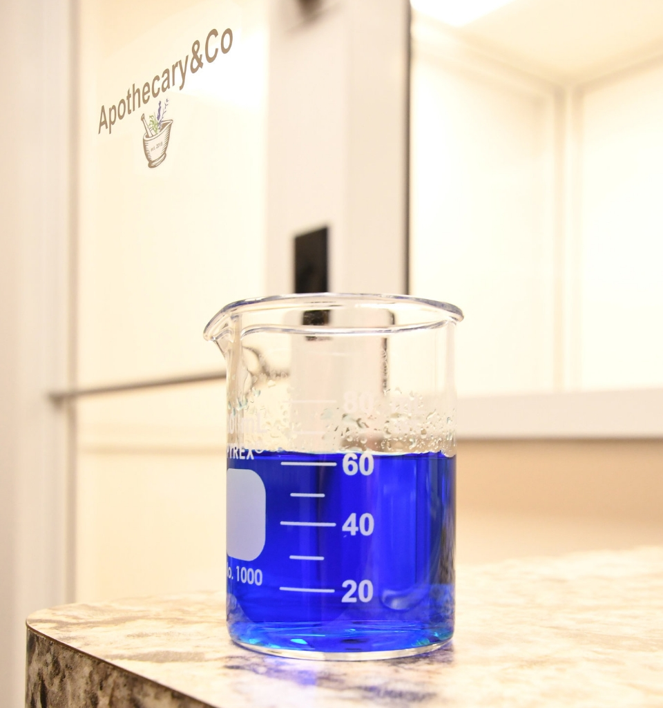 blue liquid in beaker