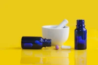 compounding pharmacy mortar and pestle with pill bottles